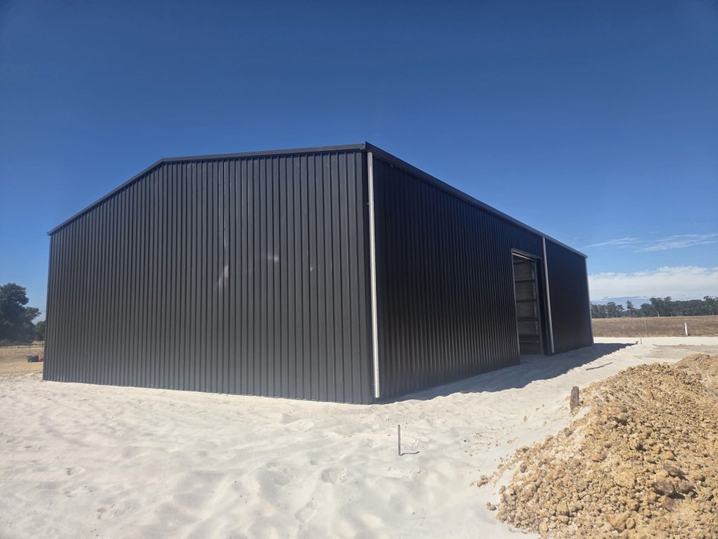 farm machinery shed dark colorbond roller door wa