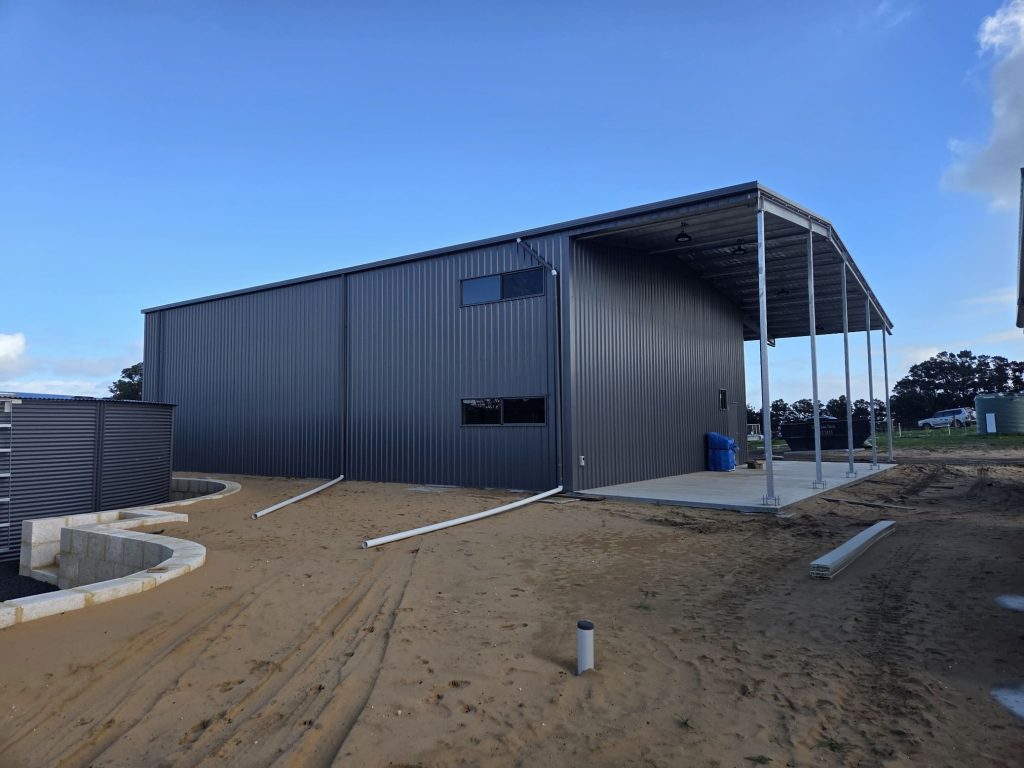 workshop shed with verandah windows south west